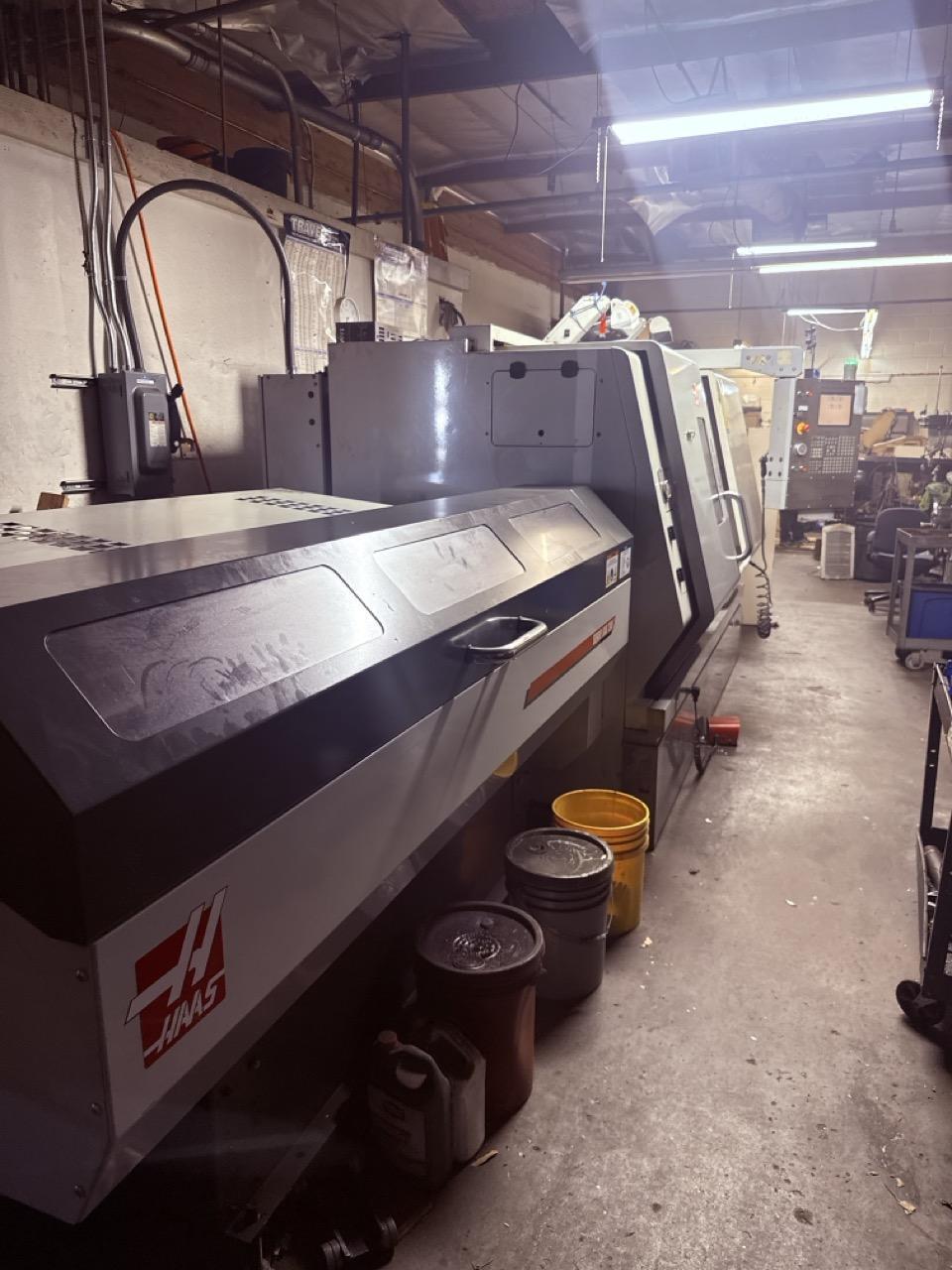 Haas SL-30 CNC Lathe, 2006 – Bar Feeder, Live Tooling
