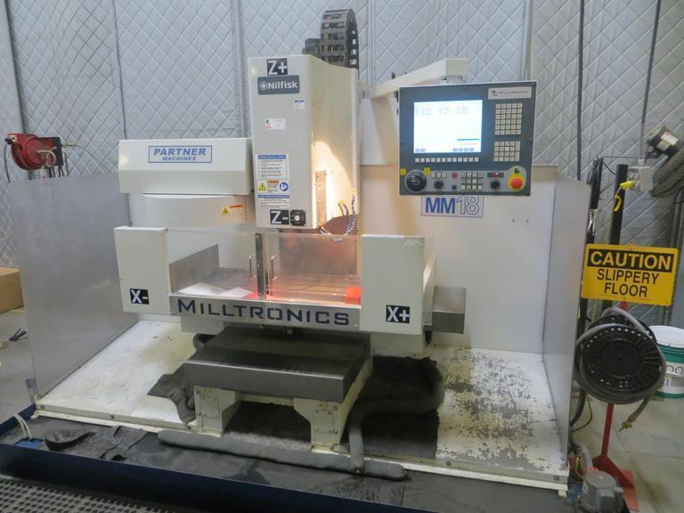 Milltronics Partner MM18 Vertical CNC Machining Center W Milltronics 7200 Control, 16 Station Carousel Tool Changer, Coolant Tank & Pump and MORE!- Auction Item