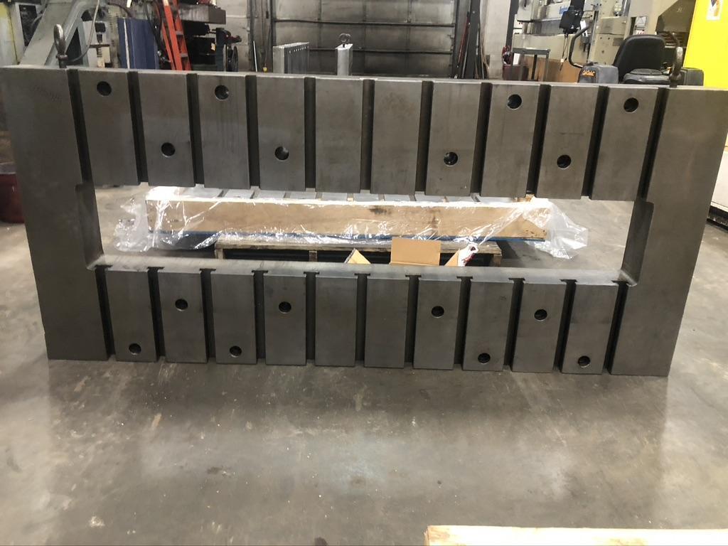 33.5" x 75"  T-Slotted Minster bolster plate, 9.8" x 63" cutout, 4.92" thick, 11 t-slots