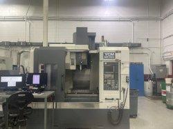 YCM NSV 102A CNC Vertical Machining Center For Sale - 2013