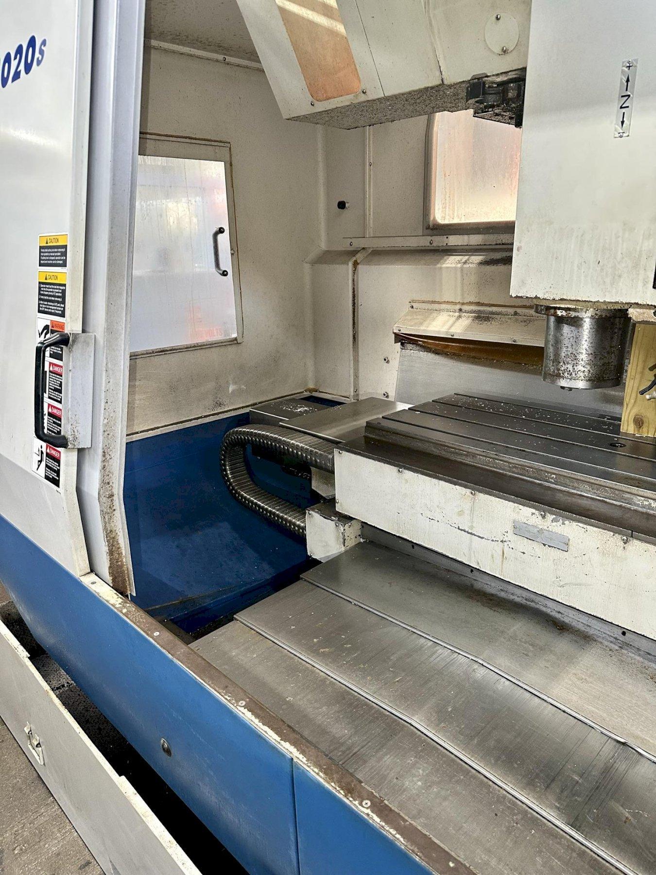 DAEWOO DMV-4020S CNC VERTICAL MACHINING CENTER, Fanuc 18iM CNC Control, 47" x 20" Table, X=40", Y=20", Z=20", CAT 40 Taper, 10,000 Max Spindle RPM, 30 ATC, Coolant System & Chip Pan, New 2002.