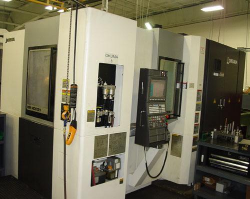 OKUMA MB-4000H CNC HORIZONTAL MACHINING CENTER, OSP -P300M CNC Control, X=22.05", Y=22.05", Z=24.61", Cat-40 Taper, 22 HP, 15000 Max Spindle RPM, ATC, Chip Conveyor, Coolant System, New 2013.
