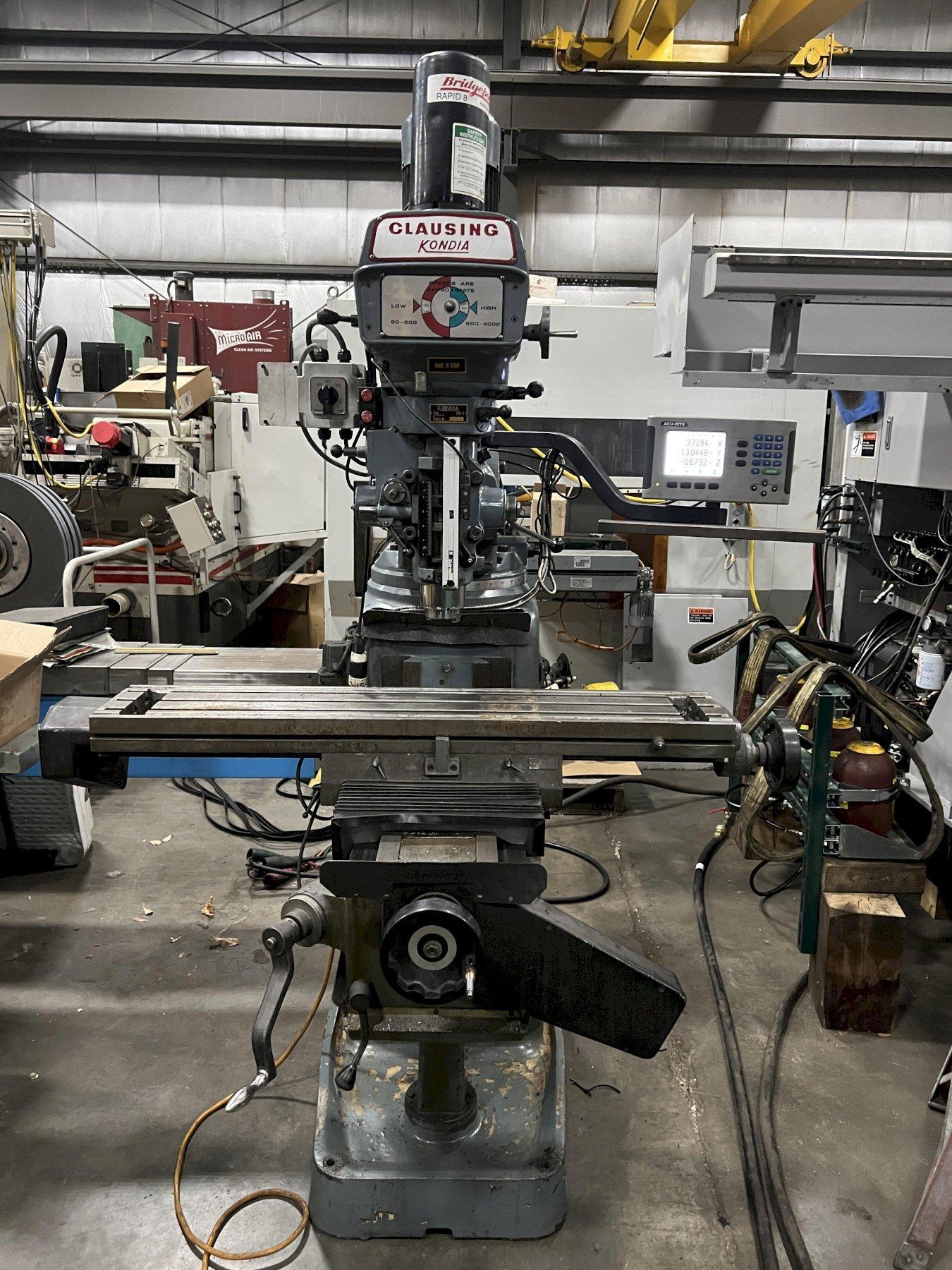 CLAUSING KONDIA VERTICAL MILL WITH ACU-RITE DRO, MODEL FV-1, 9" x 48" TABLE, MISC TOOLING, RUNS GREAT