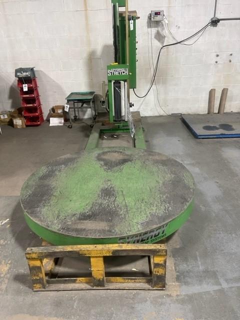 1 - PREOWNED SYNERGY 2 AUTOMATIC SHRINK WRAP MACHINE WITH HYDRO STRETCH FILM FEEDER