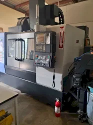 DOOSAN DNM 5700 VERTICAL MACHINING CENTER