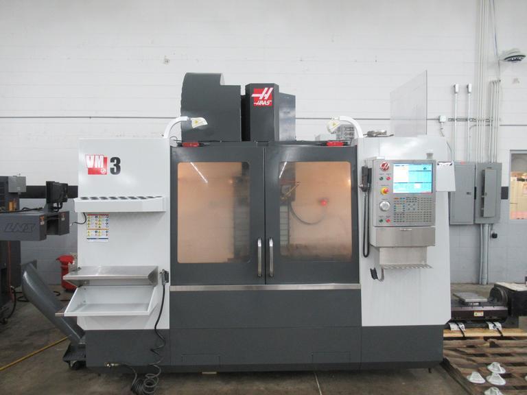 Haas VM-3 5-Axis CNC Vertical Machining Center, Haas TR-210 Trunnion, 40 Station Tool Changer, Probing, 300 PSI TSC, Chip Auger