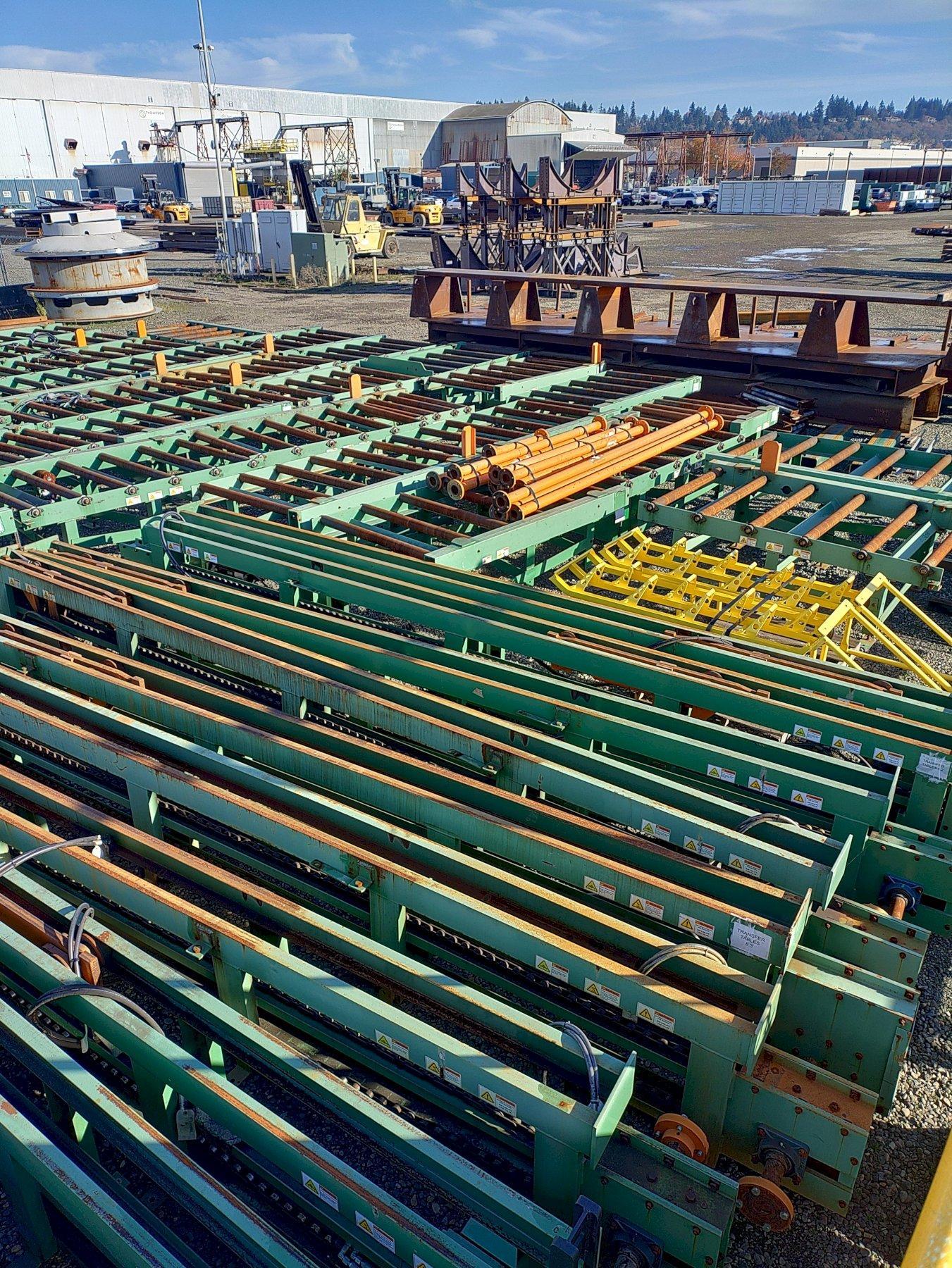 155' POWERED MATERIAL CONVEYOR WITH 7 TRANSFER ARMS. STOCK # 1213825