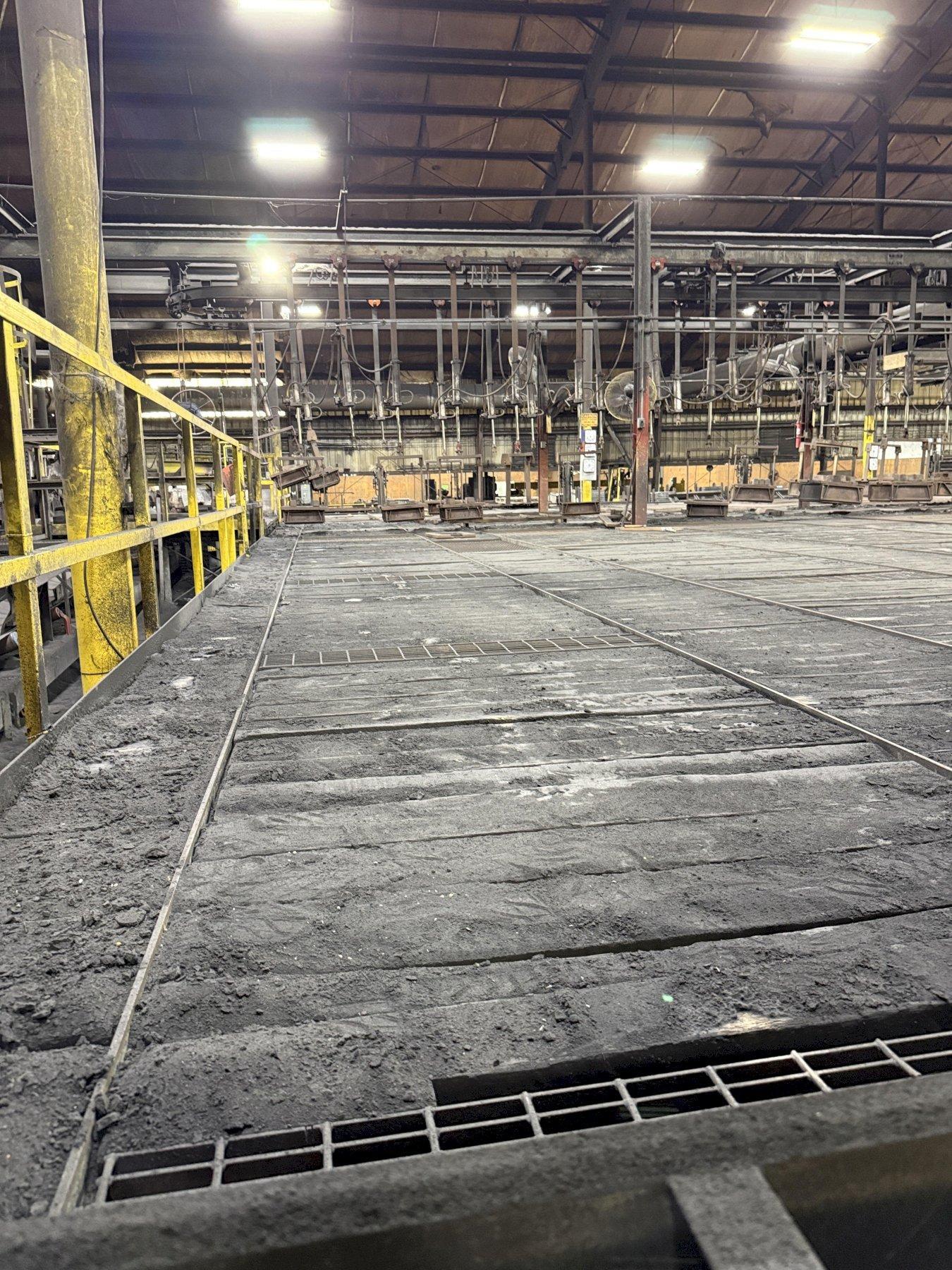 8- air operated pallet line approx. 80' long with air dump and air lifts, 20" x 60" trays, price is for all