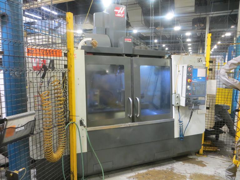 Haas VF-4 CNC Vertical Machining Center, Maincon CNC Control, 4th Drive, 24 ATC, Thru Spindle Coolant, 8100 RPM Gearbox Spindle, New 2013- Auction Item