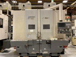 2011 Okuma 2SP-V40 - CNC Twin Spindle Vertical Turret Lathe
