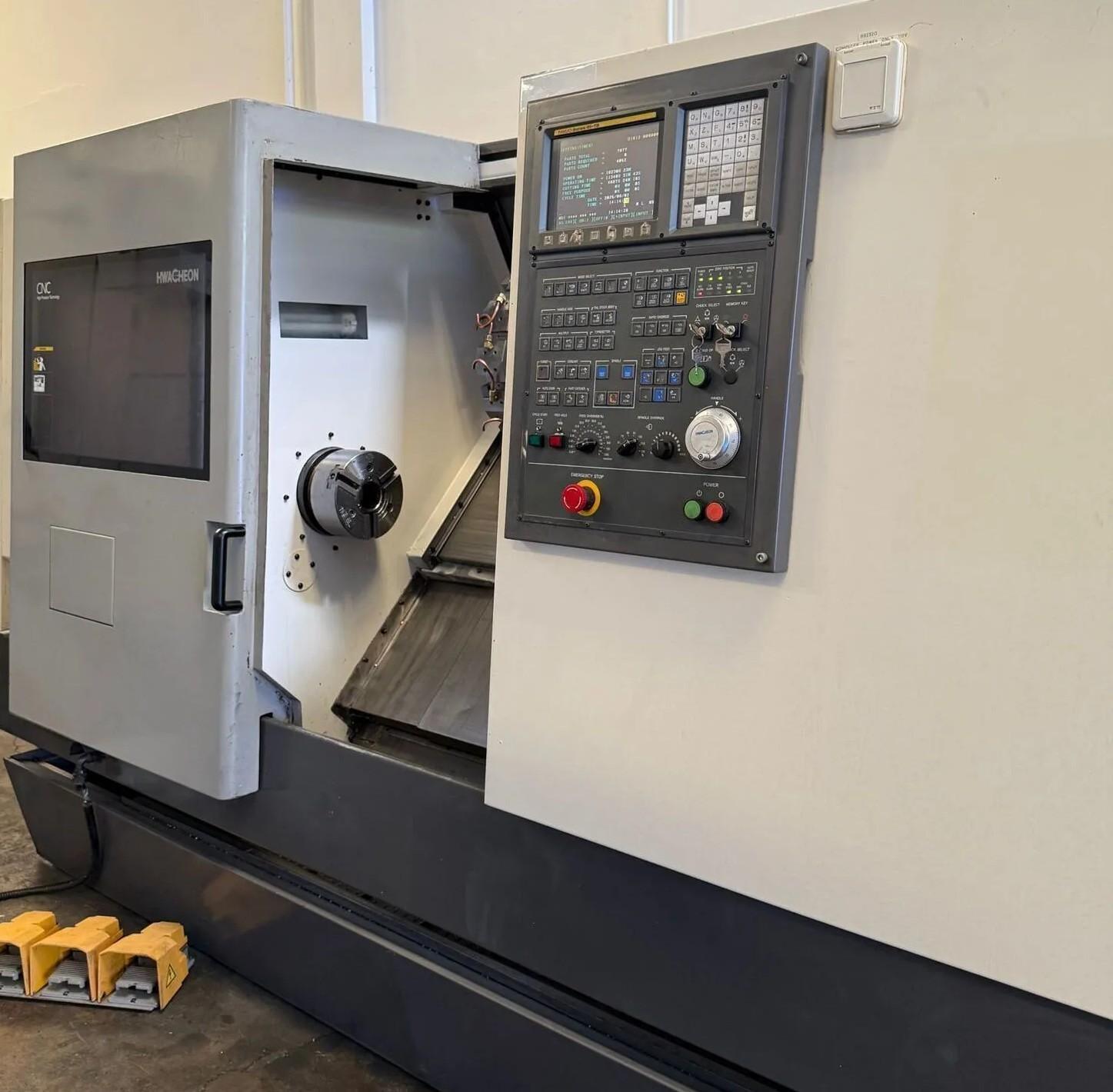 HWACHEON CNC TURNING CENTER CUTEX 240 Year 2005 Fanuc Oi-TB 8” Chuck, Tail Stock