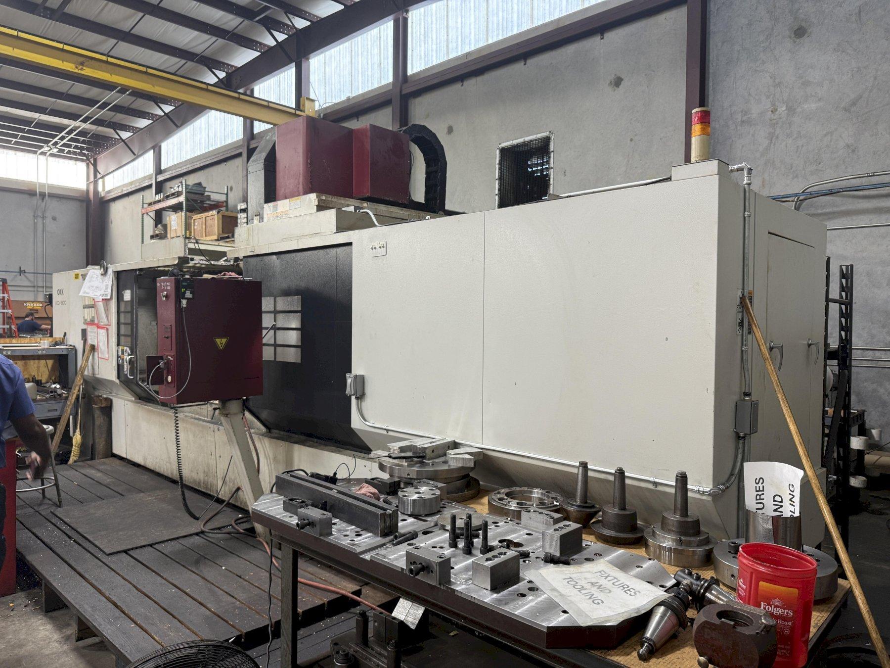 OKK, MODEL KCV 800 CNC VERTICAL MACHINING CENTER, 120" X, 33" Y, 28" Z, 40 ATC, 12,0000 RPM, 2007, EXC.