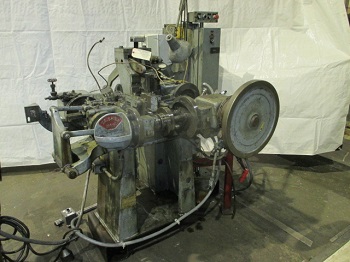 US BAIRD # 1 FOUR SLIDE MACHINE WITH STRAIGHTENER AND COIL STAND