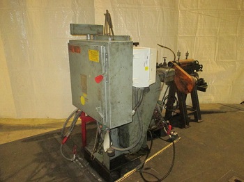 US BAIRD # 1 FOUR SLIDE MACHINE WITH STRAIGHTENER AND COIL STAND