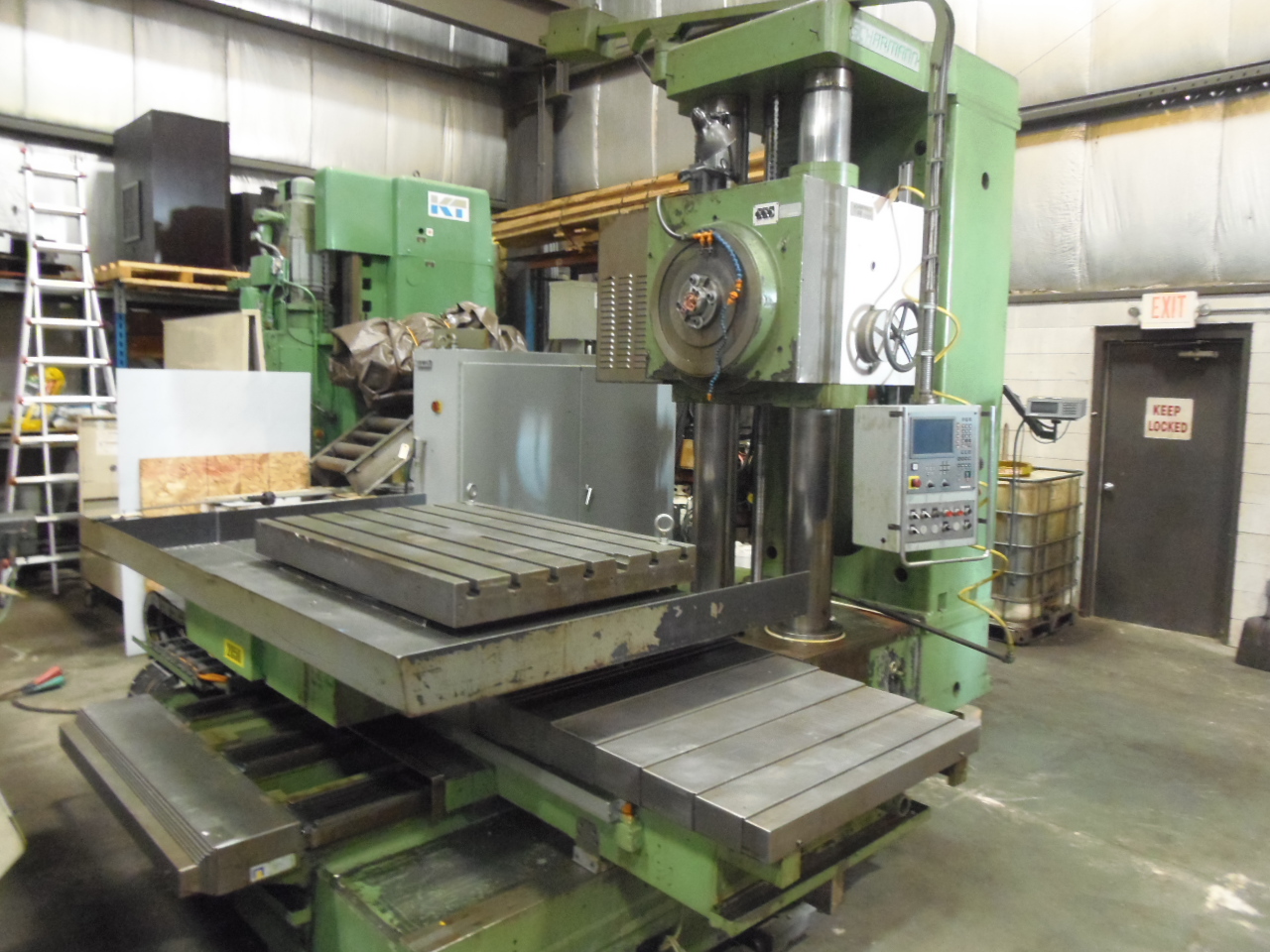 4" SCHARMANN MODEL FB100, HEIDENHAIN TNC 310 CONTROL, 39" X 48" INDEX TABLE, 56" X 48" X 47" X 21" TRAVELS, 50 TAPER
