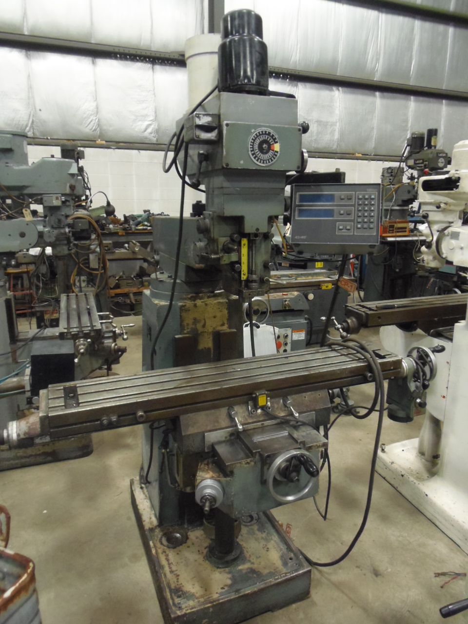 YCM SUPERMAX VERTICAL MILL, 9" x 49" TABLE, 2 AXIS DRO, POWER FEED ON X, POWER DRAW BAR