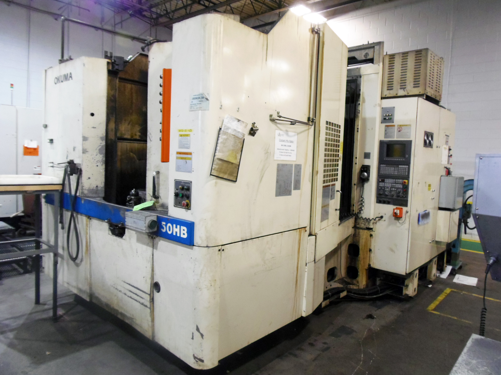 OKUMA MX50HB, DUAL PALLETS, OSP7000M CONTROL, ONE DEGREE, 5,000 RPM, THRU SPINDLE COOLANT, 1998