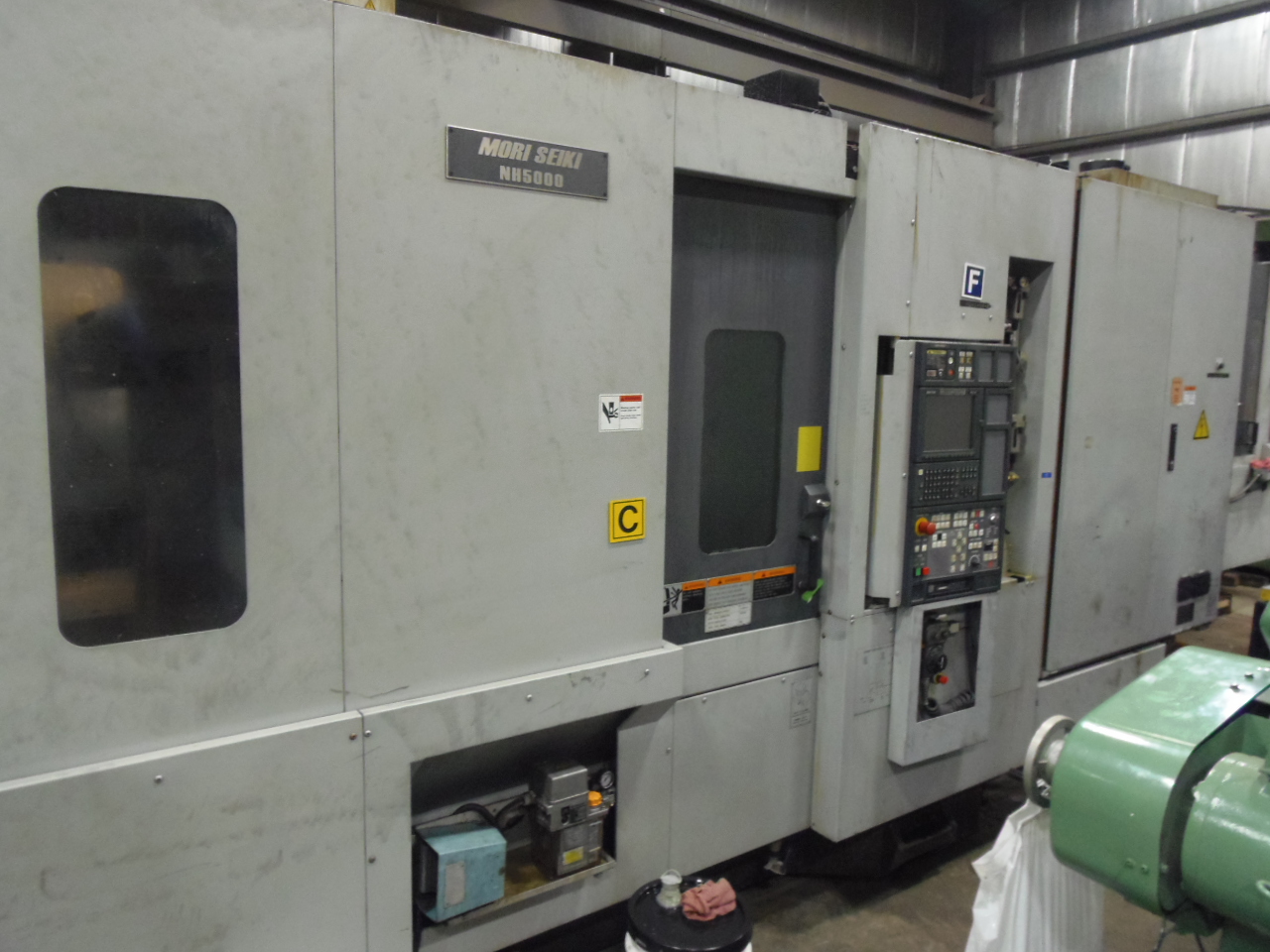 NH-5000/40 MORI SEIKI HORIZONTAL MACHINING CENTER, WITH COOLANT SYSTEM, MODEL NH5000, 2003, THRU SPINDLE COOLANT, 1 DEGREE, MSC501 WITH MAPPS, 60 ATC, 40 TAPER, 2 PALLET, 14,000 RPM