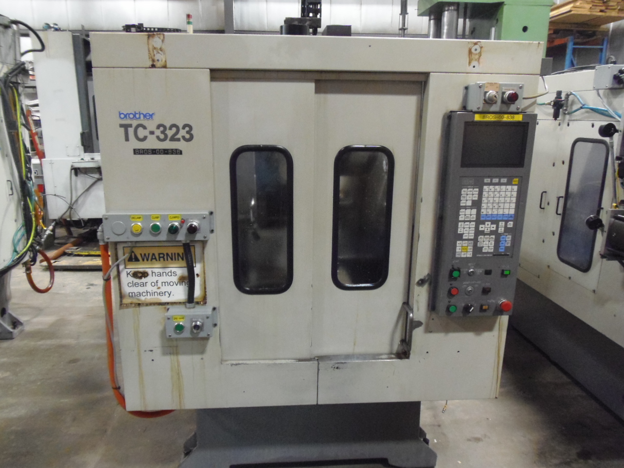 BROTHERS TC-323, 10 ATC, PALLET SHUTTLE, CONVERSATIONAL CONTROL, COOLANT