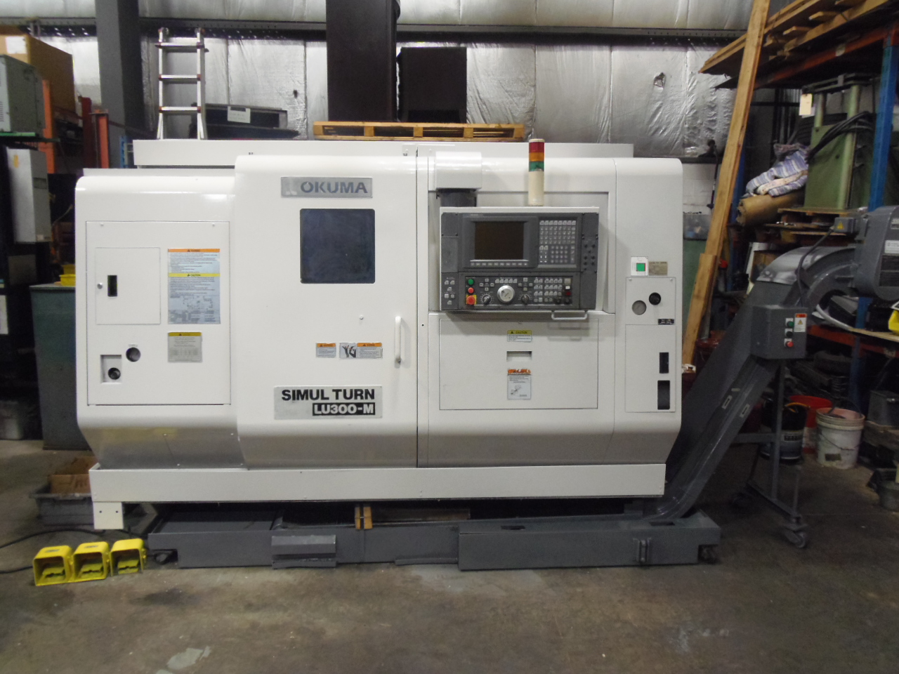 OKUMA LU300-M SIMULTURN, LIVE TOOLING, 5 AXIS, TAILSTOCK, OSP E100L CONTROL, CHIP CONVEYOR, 10" CHUCK, 2003