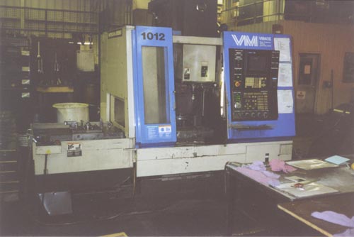 HITACHI SEIKI VM40 II,2 PALLETS,8000 RPM,40 TAPER,PROBE,SEICOS 32 BIT CONTROL,95