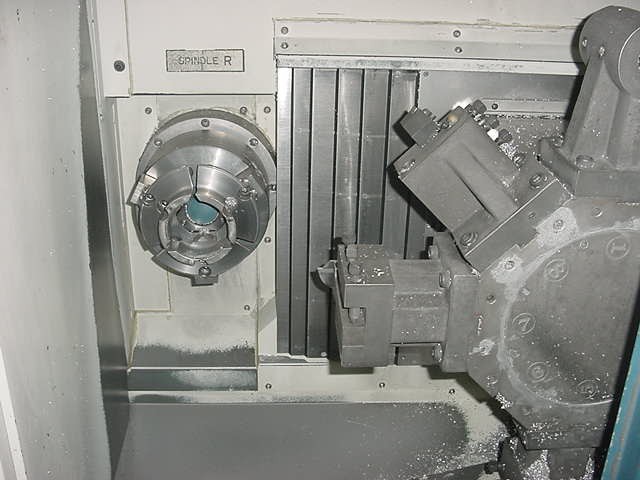 DAEWOO PUMA 8-2SP, 4-AXIS, FANUC 0TTC, (2) 10" CHUCKS, 3500 RPM, 20HP, 96/98 (6635)