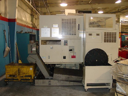OKUMA MX-55VA, OSP-7000M, 41.2" x 22" x 17.7", CAT 40, 7000 RPM, 4TH AXIS, CHIP, '99