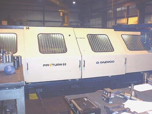 DAEWOO PROTURN 60, 27" SW, 160" CC, FANUC OT, 2000 RPM, 15" CHK, 1996