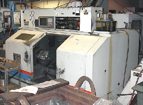 TAKISAWA TC-3, FANUC OTC, 19.68" SWING, 26.56" CENTERS, 10" CHUCK, CHIP, TAIL, '91