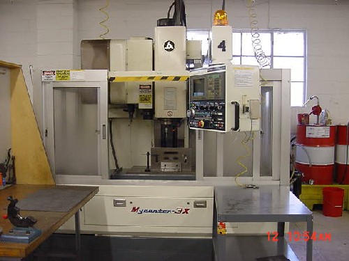 KITAMURA MYCENTER 3X, YASNAC I80M, 30" x 18" x 18", 10000 RPM CAT 40 15HP, '96