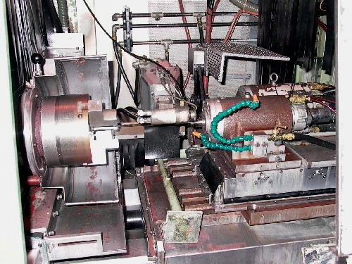 OKUMA GI-20N, 15.75" SW, 19.69" STR, 2 SPDLS, 45000 RPM,15-4500 RPM,OSP 5020 G CTRL, 1992