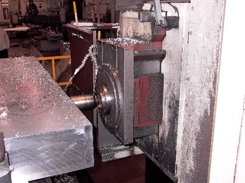 5.2" OLYMPIA CNC FLOOR BAR, 26' HORIZ, 9'10" VERT., FANUC 15M, 80 X 80 ROTARY, 2000 RPM, 50 TAPER