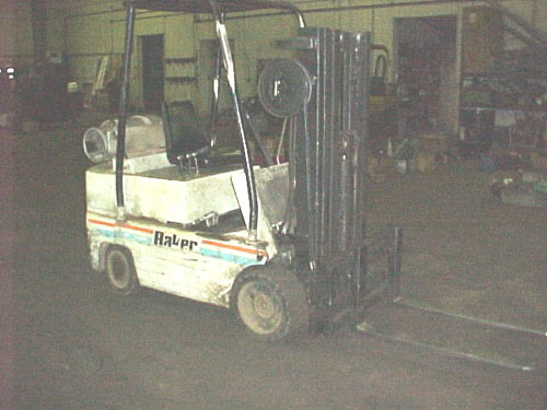 5,000 LB. BAKER FMD-050, HARD RUBBER TIRES, LP, MAX. LIFT HGT 120"
