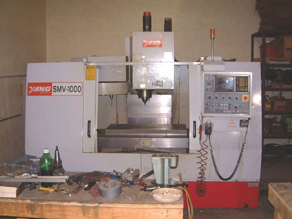 YANG SMV-1000, 42" x 19" TBL, 40"-X, 20"-Y, 20"-Z, CT 40 TAPER, 6000 RPM, 1998, FANUC O-MD CTRL, RIGID TAPPING