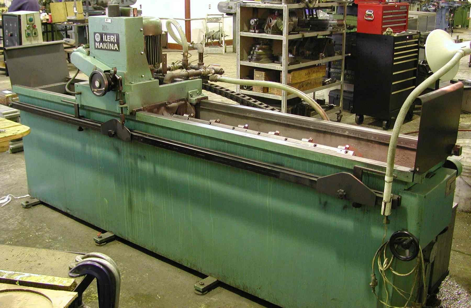10" X 96" ILERI, 5 HP,2 CHKS 41" x 7" EA., DOWNFEED COUNTER, LARGE COOLANT TANK, 1998