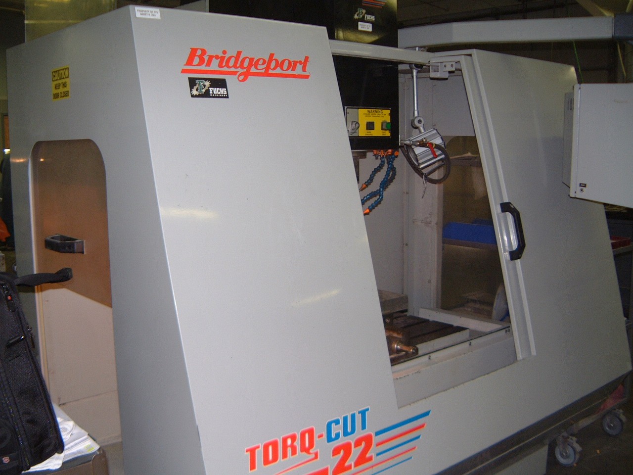 BRIDGEPORT TORQ-CUT 22,  X-22", Y-16", Z-20", 45" x 16" TBL, NO 40 BT TAPER, 22 ATC, DX-32 CTRL, AUTO LUB SYS., 1997