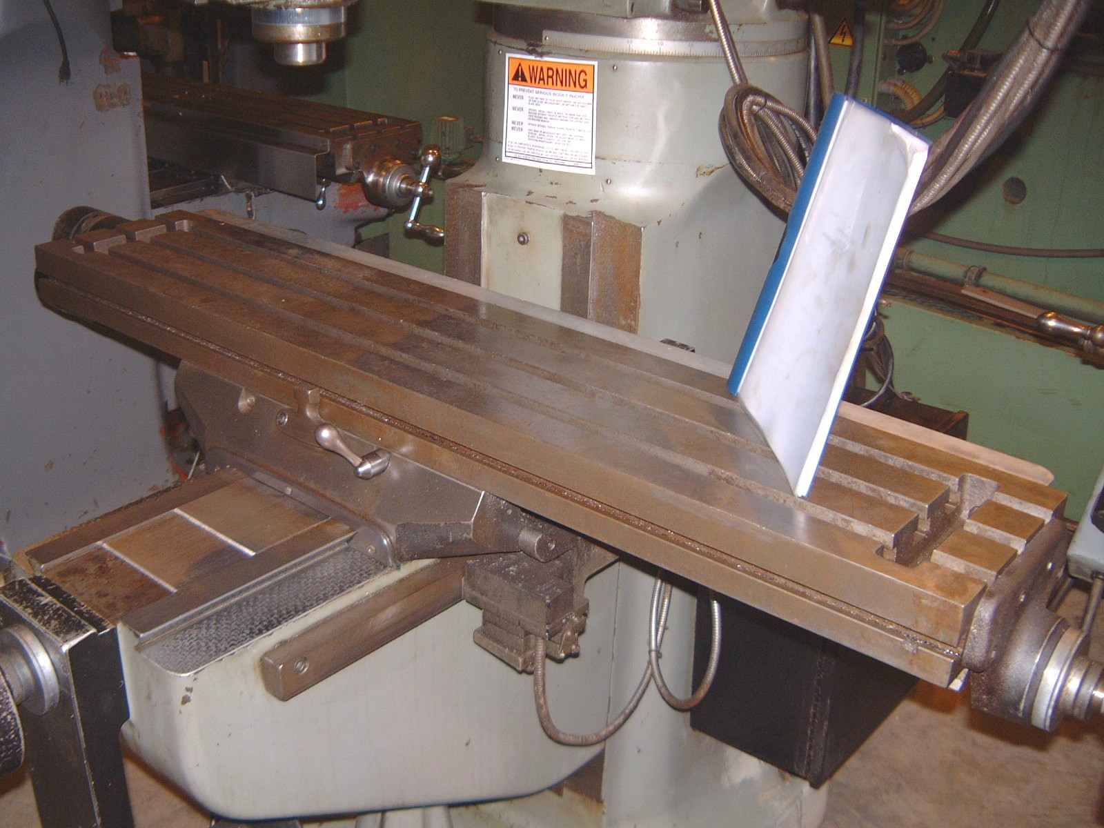 BRIDGEPORT SERIES I, 9" x 48" TBL, 32"-X, 12"-Y, 16" KNEE, 5" QUILL, R8 TAPER, PROTOTRAK PLUS 2- AXIS CNC CTRL, 1985