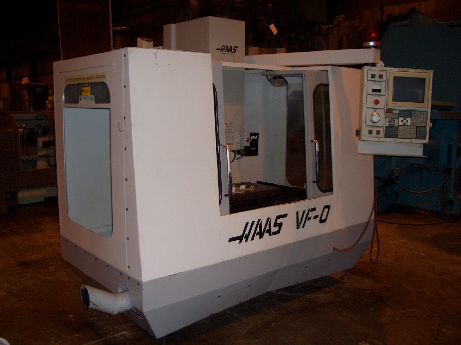 HAAS VF-0, 20" x 16" x 20" TRVLS, 14" x 26" TBL, #40 TAPER, 0-7500 RPM, 710 IPM, HAAS CTRL, PROGRAMMABLE COOLANT