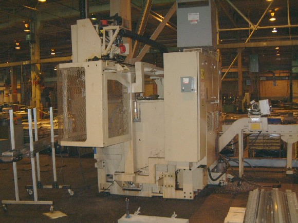 MIYANO LP-21, 11" SW OVER BED, 2.2" HOLE, 40-4000 RPM, FANUC 18-T CTRL, PICK & PLACE GANTRY, CHIP CONVEYOR, 1997