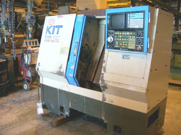 KIA KIT 30A, 18.9" SW, 5.9" TURNING DIA., 1.5" BAR CAP., 50-5000 RPM, 7.5 HP, YASNAC LX-3 CTRL, CHIP CONVEYOR