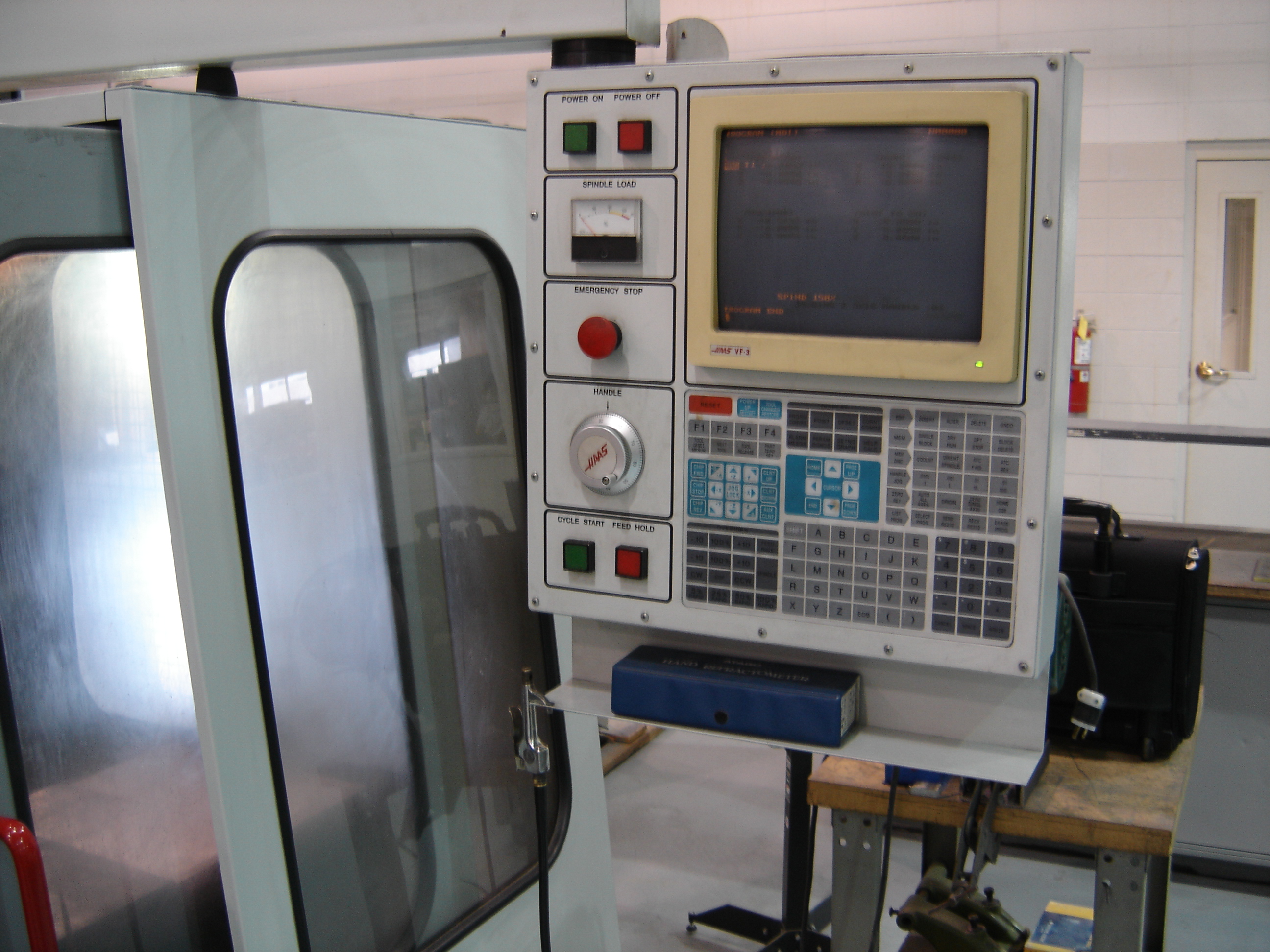 HAAS VF-3 VERTICAL MACHINING CENTER, 20 X 40 TRAVELS, 7500 RPM, HI/LOW GEAR RANGE OPTION, MACRO'S, CAT 40, 20 ATC