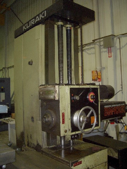 4" KURAKI MDL BM-10DX, X-59", Y-39.5", Z-27.6", QUILL 21", TABLE 37" x 43", 1200 RPM, FANUC 3M CTRL