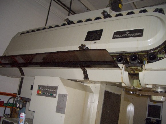 LEBLOND-MAKINO FNC128, 50"-X, 32"-Y, 28"-Z, 33" THROAT, 32" x 72" TBL, CAT 50, FANUC 6M CTRL, 40 ATC, 1984