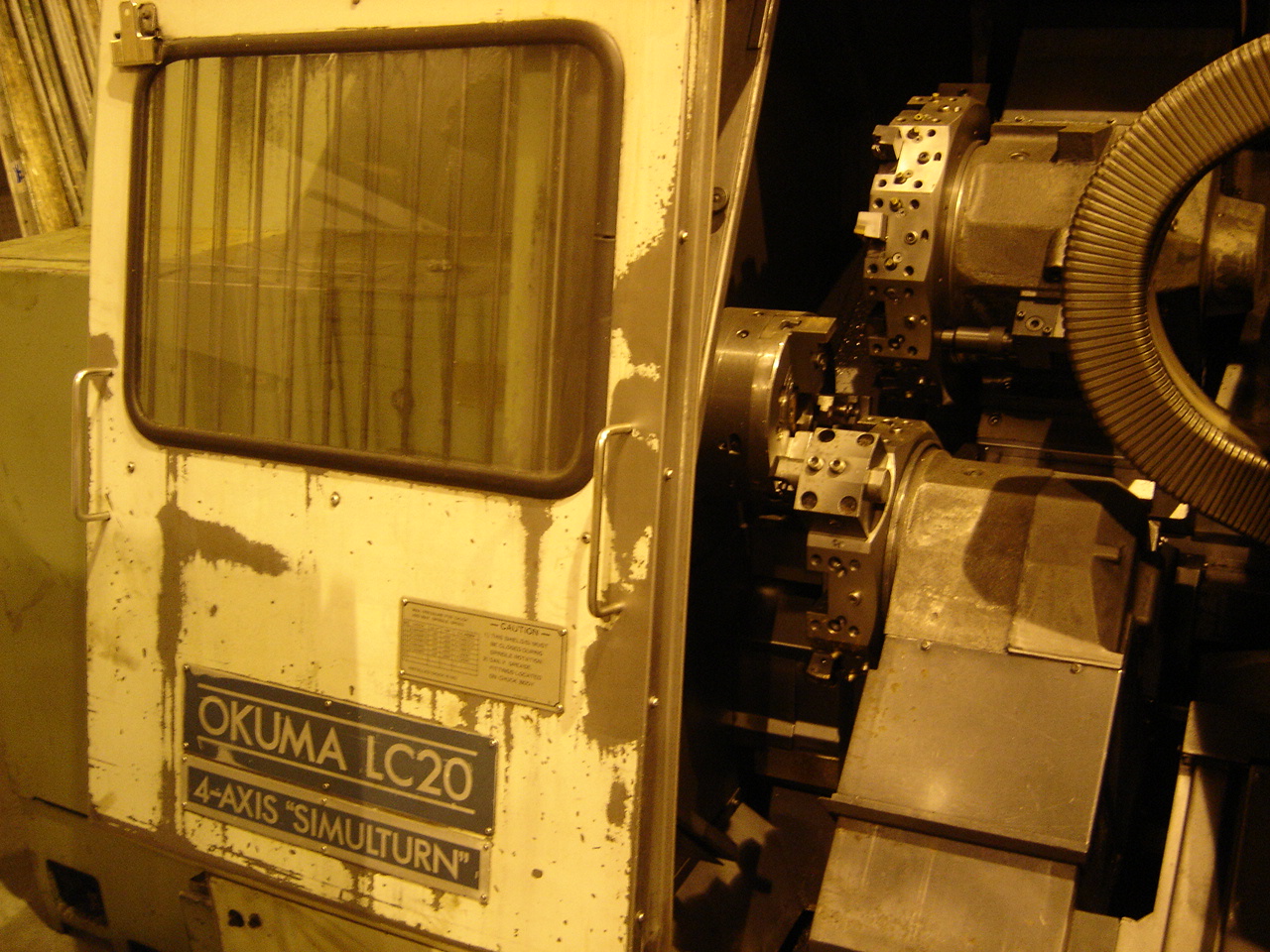 OKUMA LC20-2S, OSP500L CTRL,  15.75" SWOB, 2.05 BORE DIA., 3500 RPM, CHIP CONVEYOR, 4-AXIS