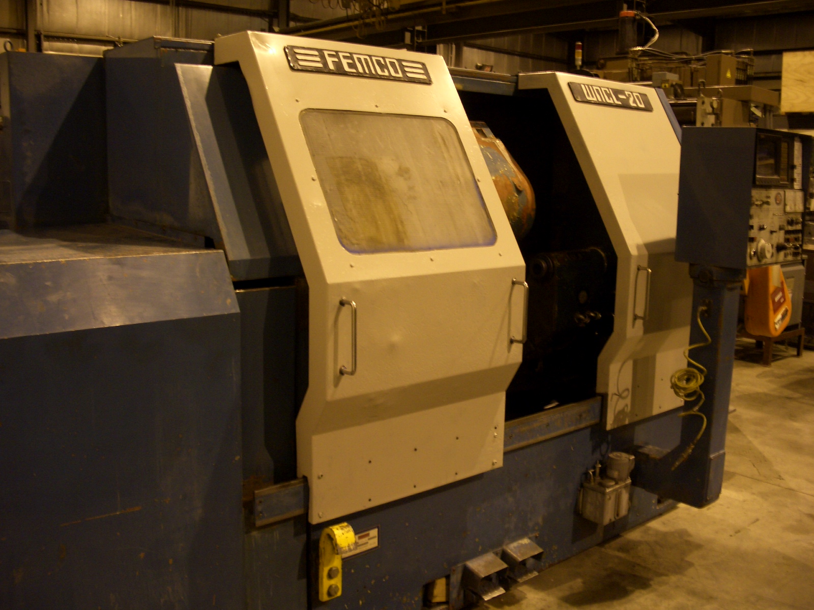 FEMCO WNCL-20/60, 21.2" SW, 8" CHUCK, 30" CENTERS, 15 HP,, FANUC 10T CTRL, RUNS GREAT