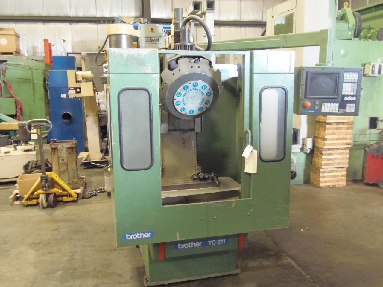 BROTHER TC-211, 19.69 IN.  X 8.66 IN. TBL, 11.81 -X, 8.66 -Y, 7.87 -Z, 6000 RPM, RIGID TAP, 10 ATC, CNC 200 CTRL