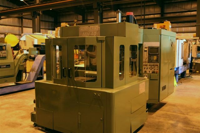 MORI SEIKI MH-40, 22&quot x 19&quot x 20&quot TRVLS, CAT 40, 40 TOOLS, 15 HP, FANUC OM-B CTRL, 1990