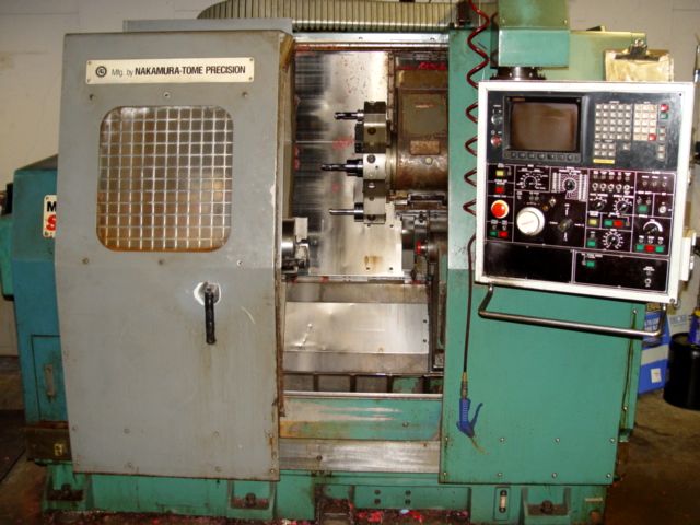 NAKAMURA TOME SLANT 1, 21.65" SW, 20.86" BC, 2.16" HOLE, 15 HP, 12 POSITIONS, FANUC 11TA CTRL, 1985