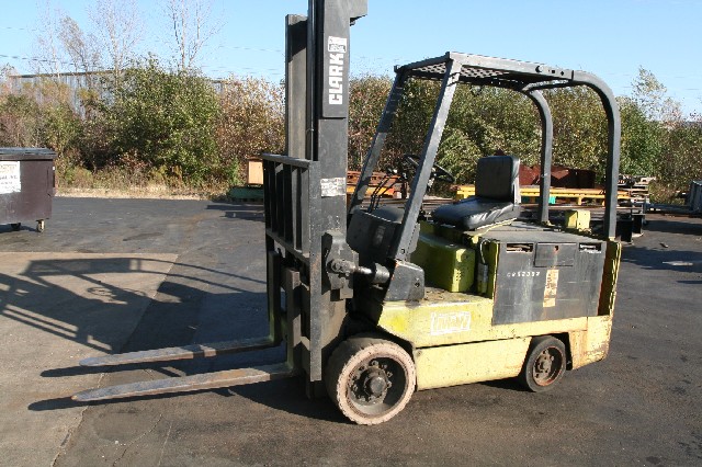 8,000 LB. CLARK, 48&quot FORK LGTH, 124&quot LIFT HEIGHT, ROLL CAGE, ELECTRIC, HARD TIRES