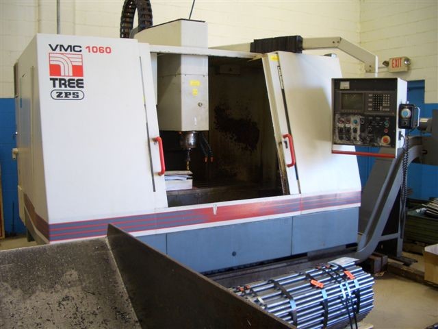 TREE VMC1060, 50" x 24" TBL, 40"-X, 24"-Y, 25"-Z, 15/20 HP, CAT 40, 24 ATC, DELTA DYNA PATH AUTOCON CTRL, 1997